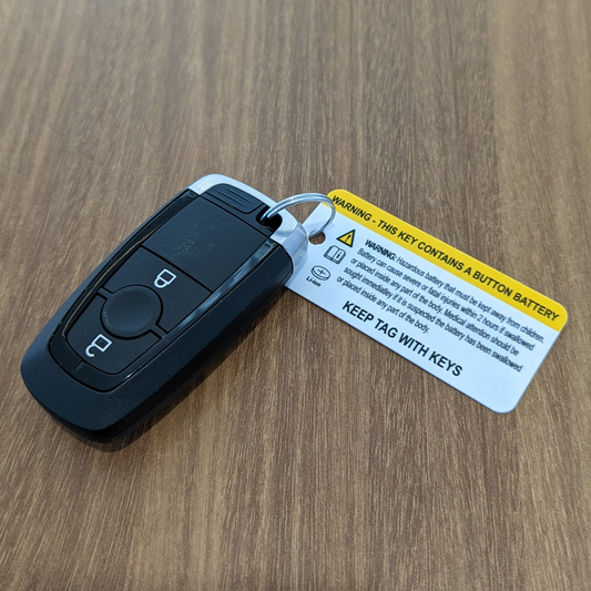 150 X Button Battery Warning Label /  Key Tag with Ring